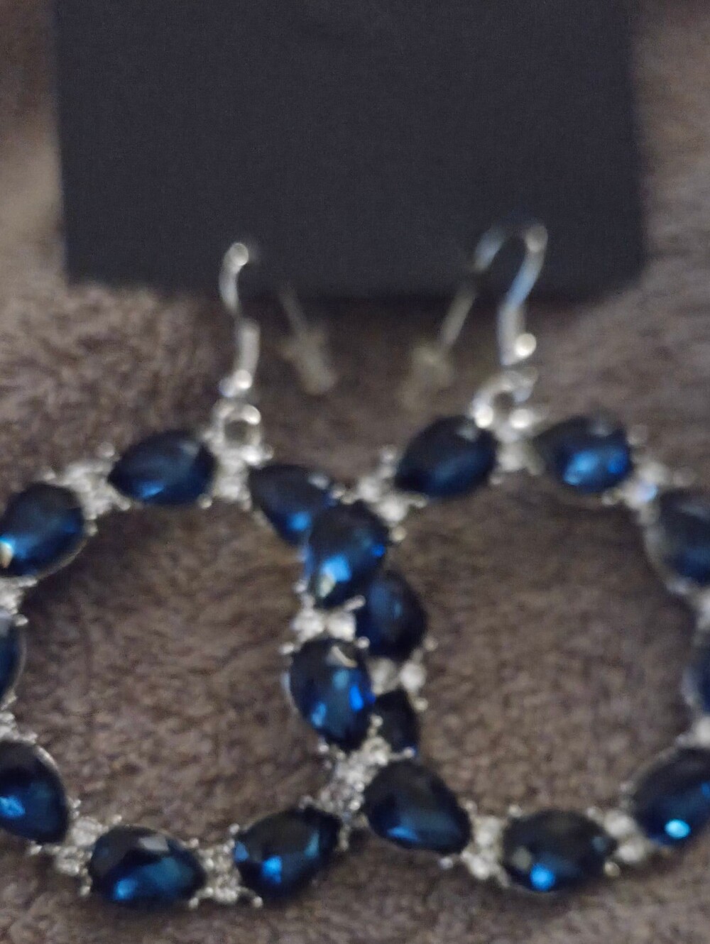 Silver Circular Hoop Earrings with Deep Blue Teardrop Stones